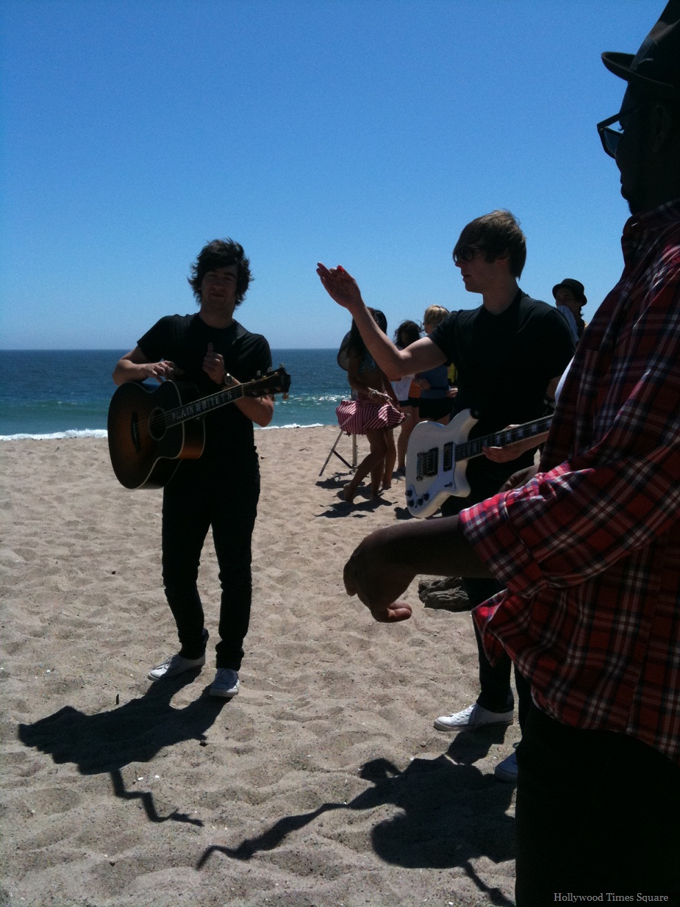 Plain White T's figuring out the next scene (Photo by Frances Vega)